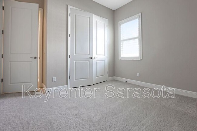 Building Photo - 6133 Lungo Lago Dr