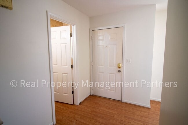 Building Photo - Forest Hills 3 Bed Townhome with Garage, Pond View and Some Utilities Included