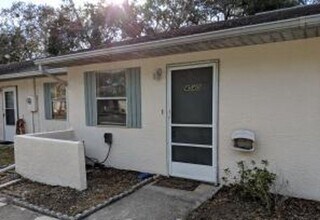 Building Photo - 2/2 Flat with Assigned Parking, Screen Porch, Inside Laundry