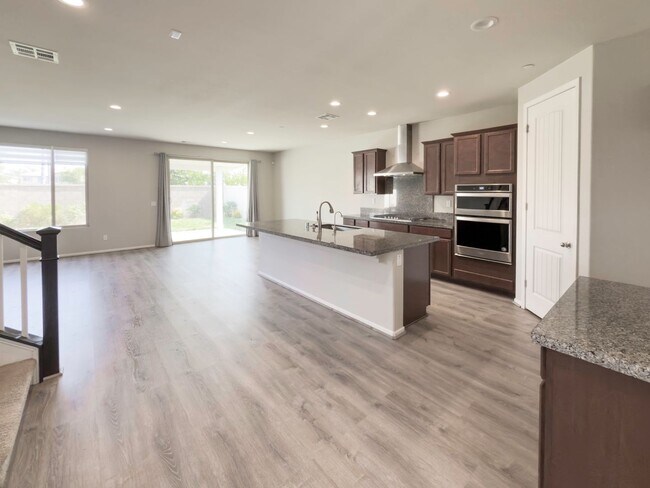 Building Photo - Beautiful 2 Story 5 Bedroom SOLAR Home + L...
