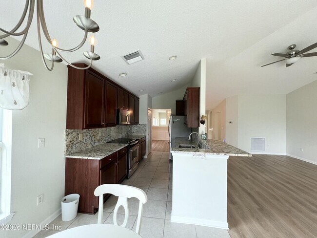 Building Photo - 6600 White Blossom Cir