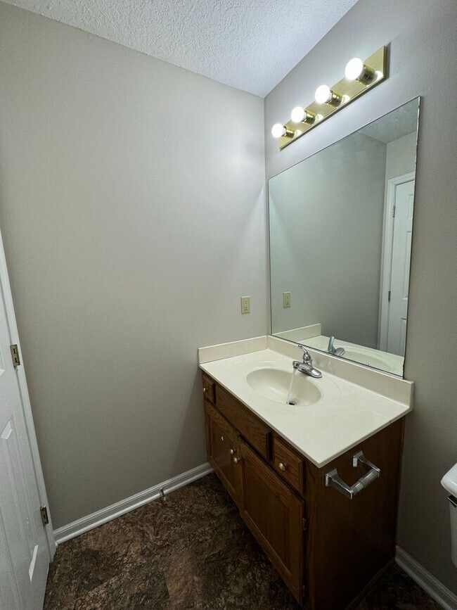 Building Photo - 3-Bedroom Duplex with Open Living Area & Private Owner’s Suite