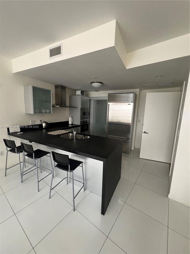 Building Photo - 18201 Collins Ave