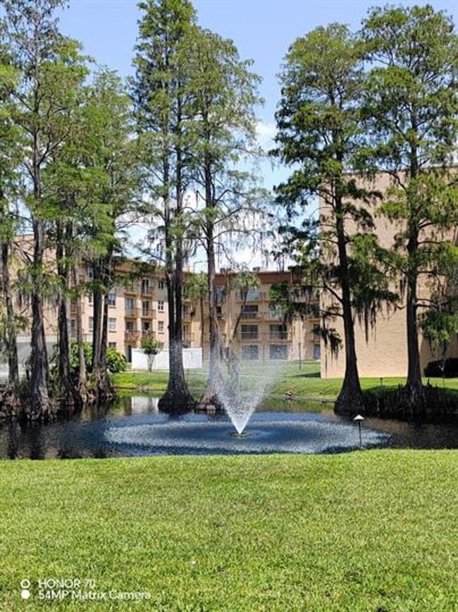 Building Photo - Welcome to Tampa Racquet Club – Where Comfort Meets Convenience!