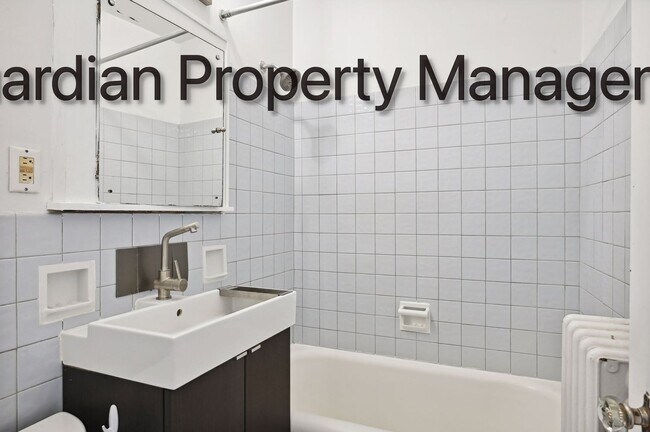 Building Photo - Linden Hills Side By Side, Hardwood Floors, Attached Garage, New Efficient Heating System, Pets W...