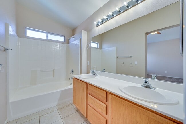 Building Photo - NW!! POOL!!!! GATED!!! Com. Park!!! Low Maintenance desert landscape front Yard. New Carpet!! Ups...