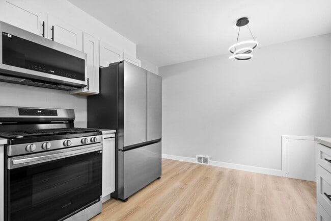 Building Photo - Freshly Remodeled 3-Bedroom Cape Cod in The Heart of Richmond Heights