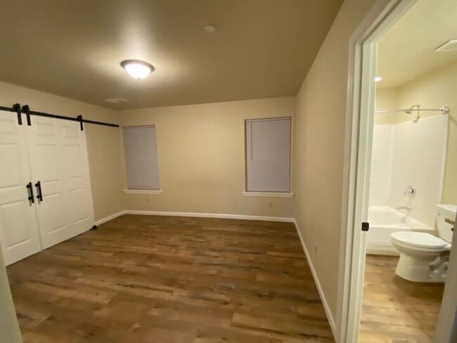 Building Photo - Simply gorgeous 3/2 with 2 car garage, dog...