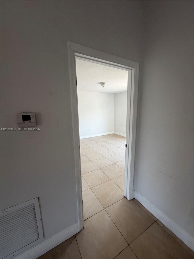 Building Photo - 7040 NW 173rd Dr