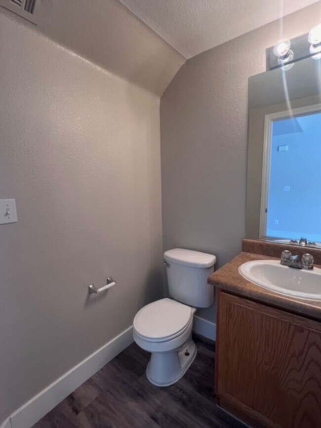 Building Photo - Three bedroom townhouse with 2 car garage