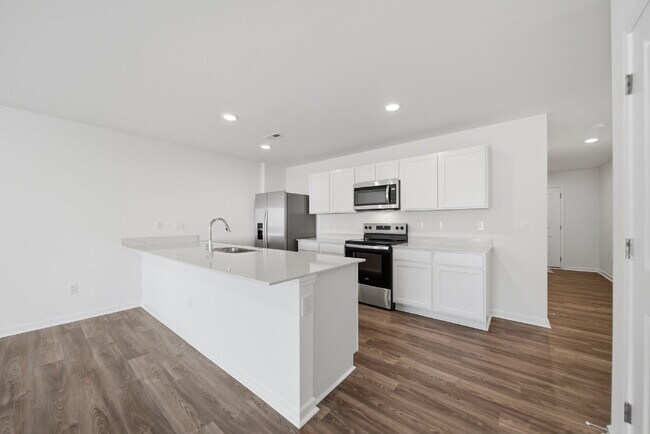 Building Photo - Modern Comfort in a Peaceful Newton Community This newly built 3-bed, 2.5-bath townhome blends mo...