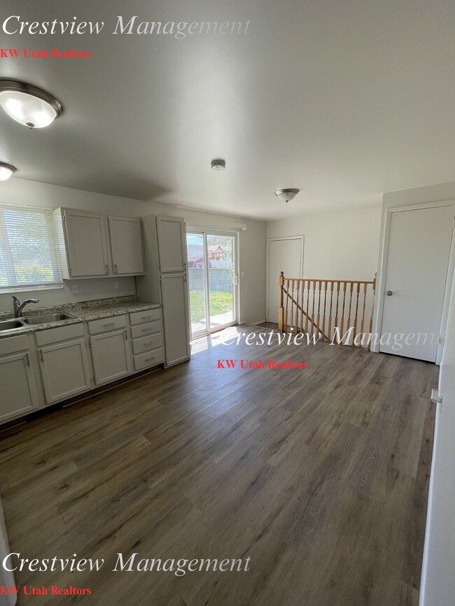 Building Photo - Charming 4-Bedroom Home in West Valley City – Spacious & Convenient Location- 1st month's rent Free!
