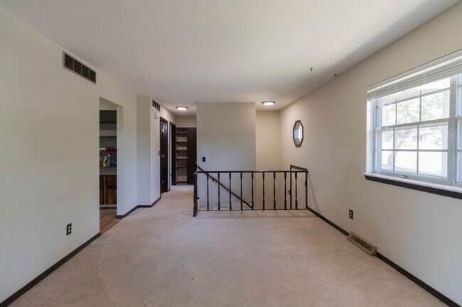 Building Photo - Charming 3BR Home-Screened Porch, Private Garage & Massive Backyard