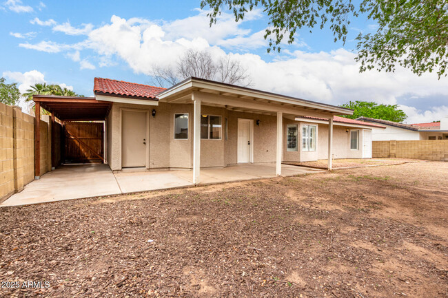 Building Photo - 421 E San Angelo Ave