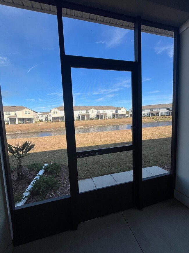 Building Photo - Town Home in The Trails -2 Primary Suites!!