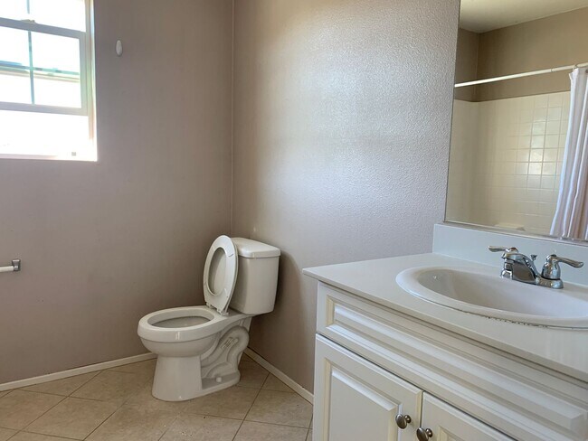 Building Photo - SOLAR HOME * CORNER HOUSE * HUGE BACK YARD * NICE PERRIS HOME.