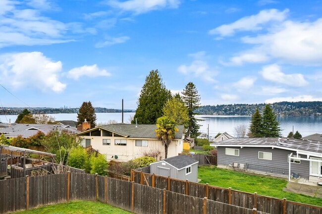 Building Photo - Water Views| Expansive Deck | Flexible Living Spaces