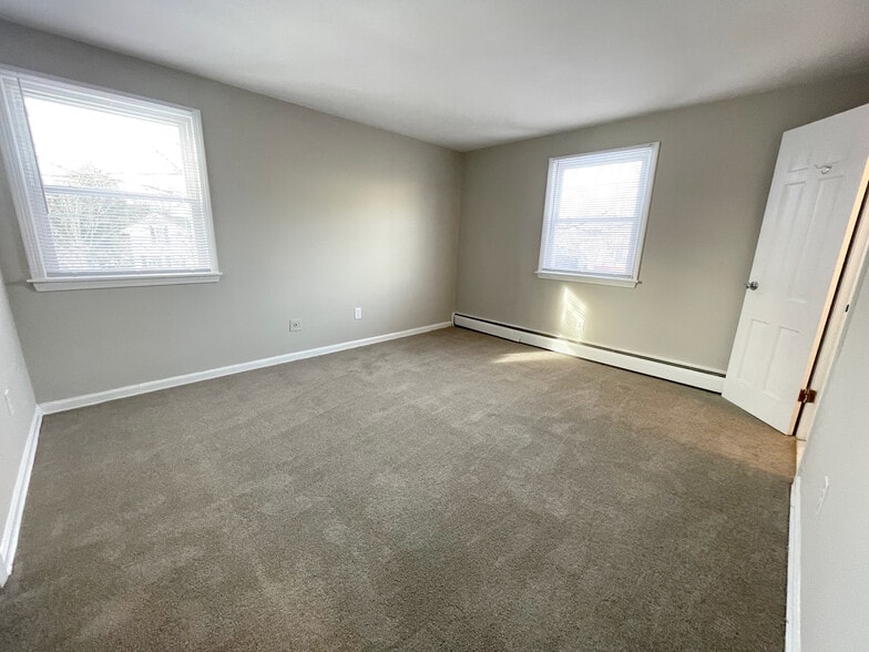 Primary Bedroom w/ En-Suite Half Bath - 14 Pierce Ave