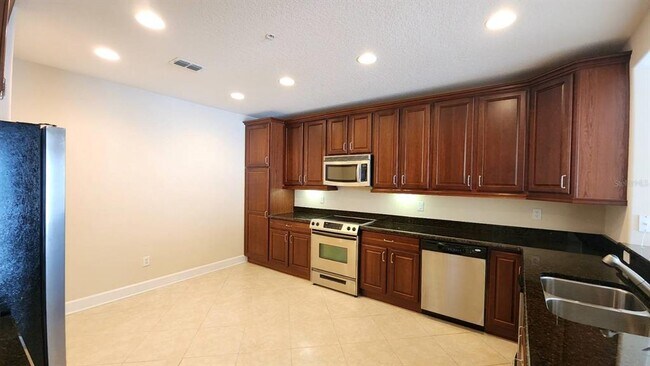 Building Photo - 7508 Toscana Blvd