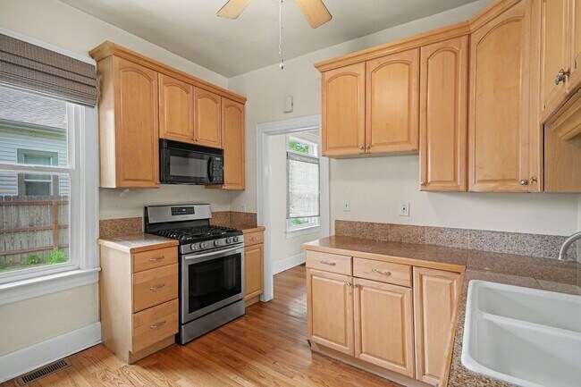 Building Photo - Beautifully Preserved Englewood Home with Fenced Backyard