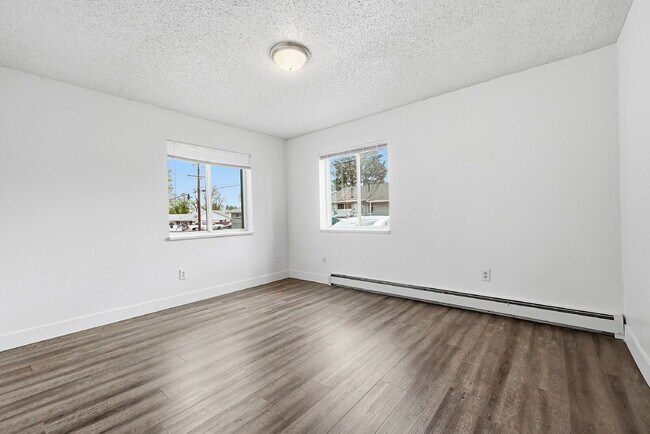 Building Photo - $1,270.95, 2-bed, 1-bath, located in Denver with a washer and dryer.