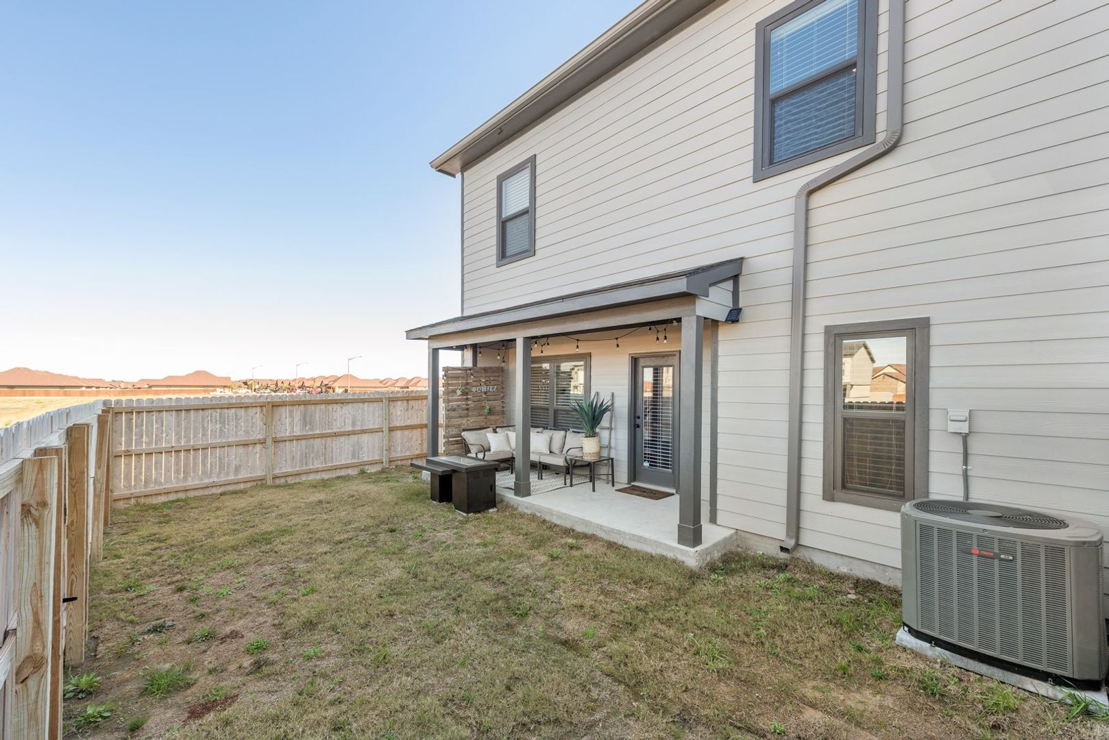 Building Photo - Now Pre-Leasing for June 2026! Well Appointed Townhomes with Fenced Backyards Close to Bus Stop &...