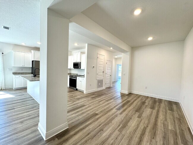 Building Photo - This gorgeous new construction home in Ward Creek overlooks a protected nature preserve.