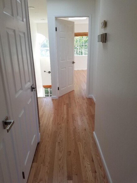 Upstairs Hallway with washer dryer in closet - 716 Flower Ave