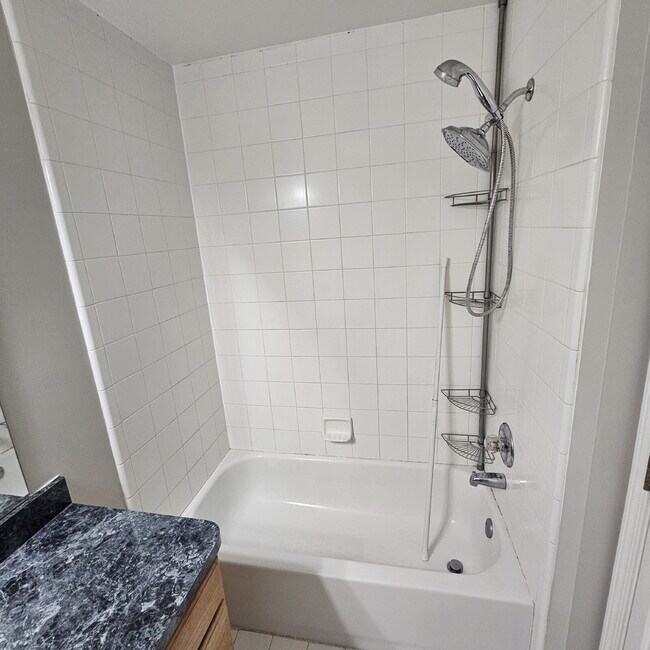 Building Photo - 2 Bedroom, 1.5 Bath Townhouse w/ Garage & Huge Master Bedroom. Full Sized Washer & Dryer In Unit.