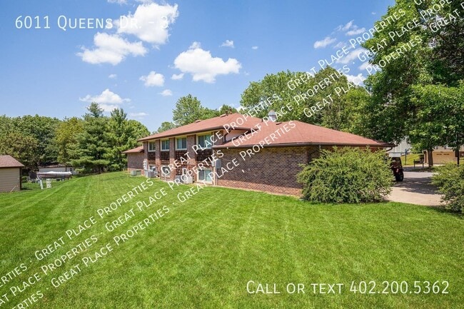 Building Photo - 6011 Queens Dr