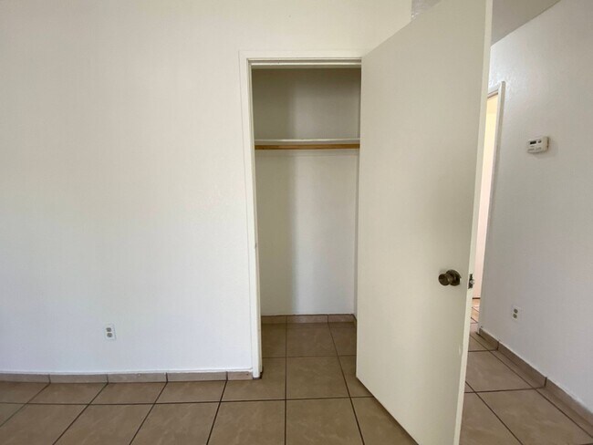 Building Photo - Two Bed, One Bath Triplex with a One Car Garage In North Stockton