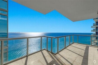 Building Photo - 17121 Collins Ave