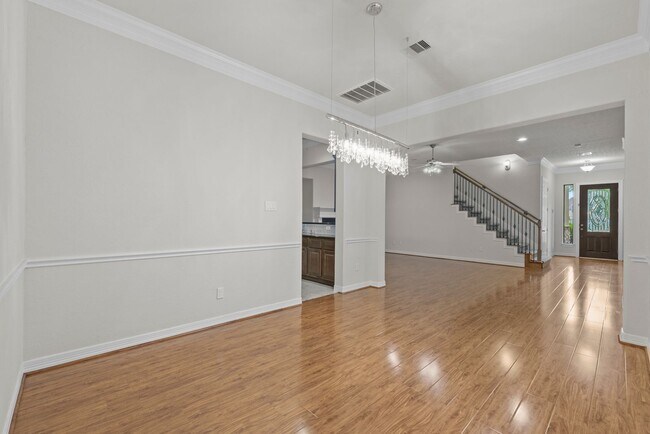 Building Photo - Luxury Townhome with Attached Garage & Outdoor Entertaining Area - $100 off first and second mont!