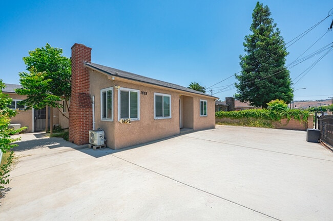 Building Photo - Fully Furnished 2BR Home with Crib — Mid-T...