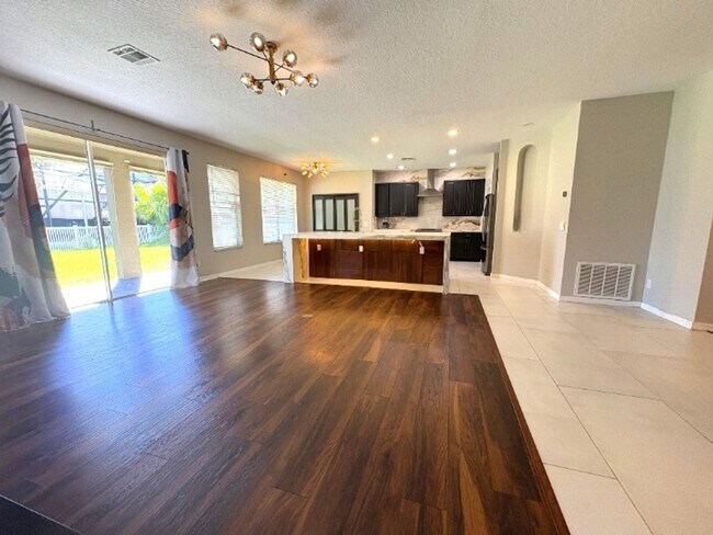 Building Photo - Available NOW!  Stunning 5-Bedroom Home in...