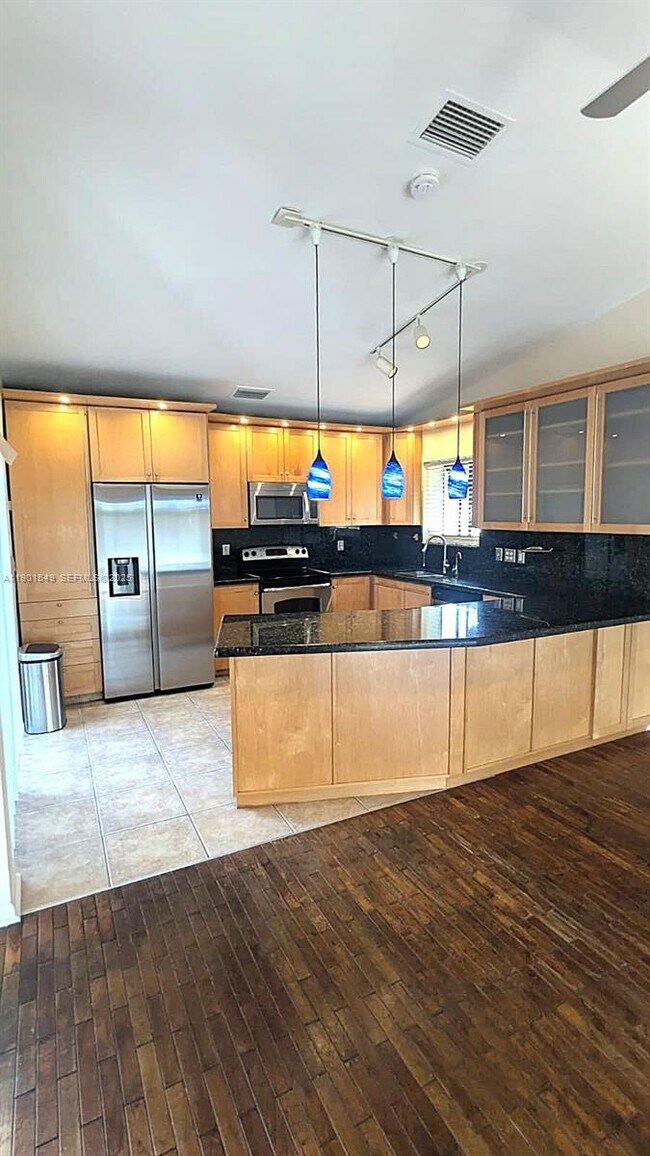 Building Photo - 10140 Torchwood Ave