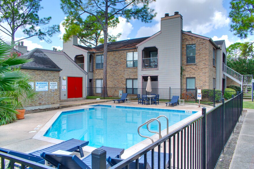 View of the complex's pool from the Northeast corner. - 2025 Augusta Dr