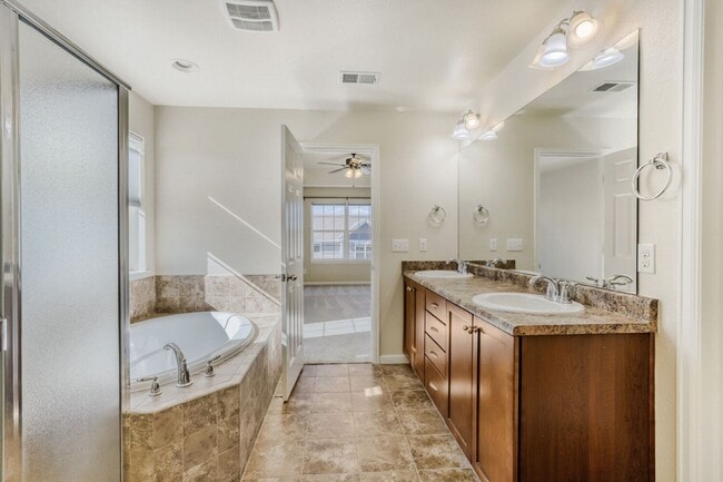 Building Photo - Bright, Seamless Living in Longmont’s Premier School District
