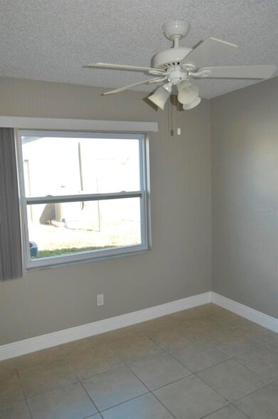 Building Photo - 6525 Manila Palm Way