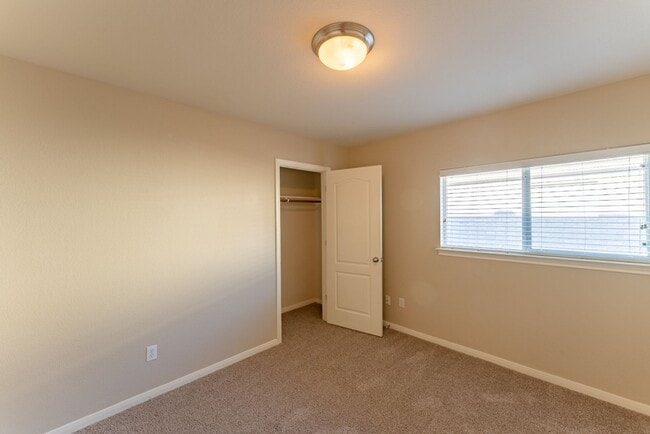 Building Photo - Charming Brick Home with Open Floorplan, Vaulted Ceilings, and Luxurious Amenities—Perfect for An...