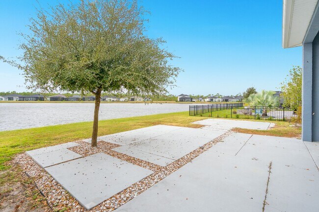 Building Photo - Luxurious Solar Powered 4 Bedroom, 3 Bath Waterfront Home with office & Upgrades Galore!