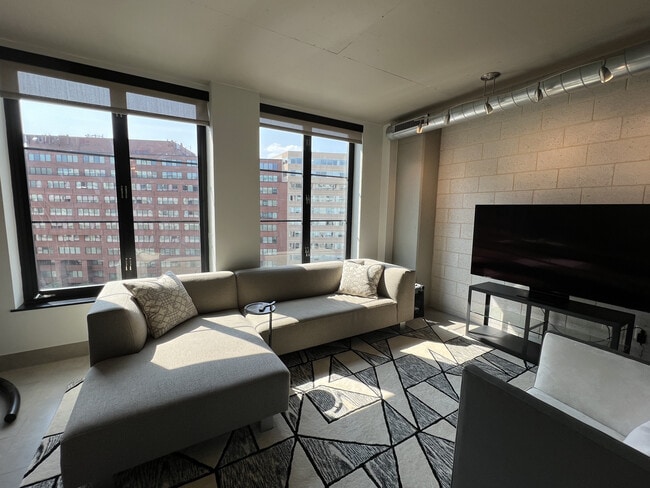 Living Room with Room&Board Sofa and 8K TV - 1133 14th St NW