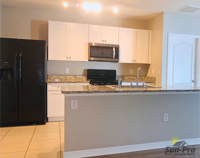 Building Photo - 2704 Star Coral Ln