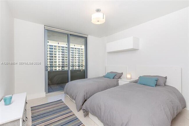 Building Photo - 5555 Collins Ave