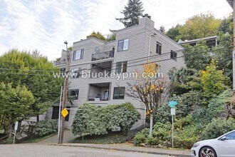 Building Photo - 2 Bed, 2 Bath Condo with Roof Top Patio, Covered Balcony and Secure Garage