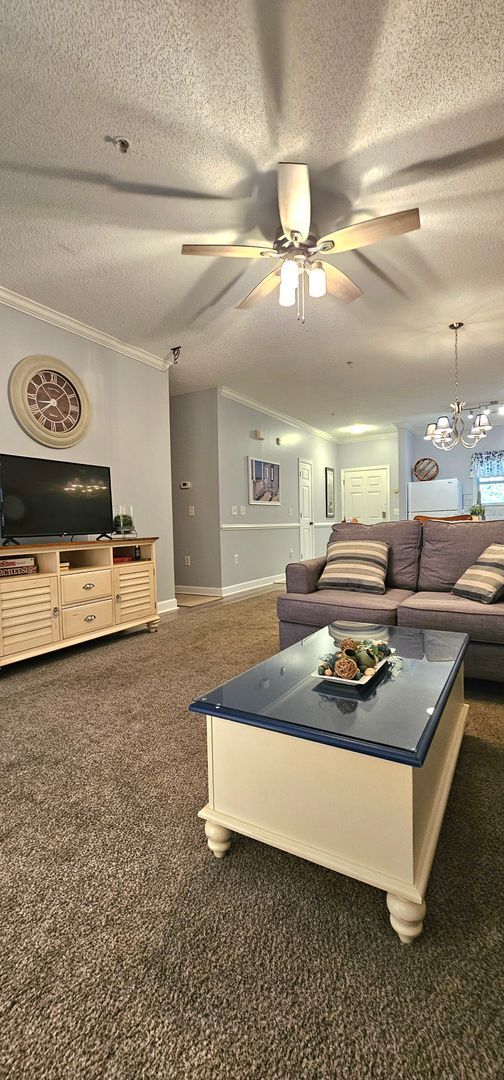 Building Photo - Stunning First-Floor, Fully Furnished Condo with Pond Views