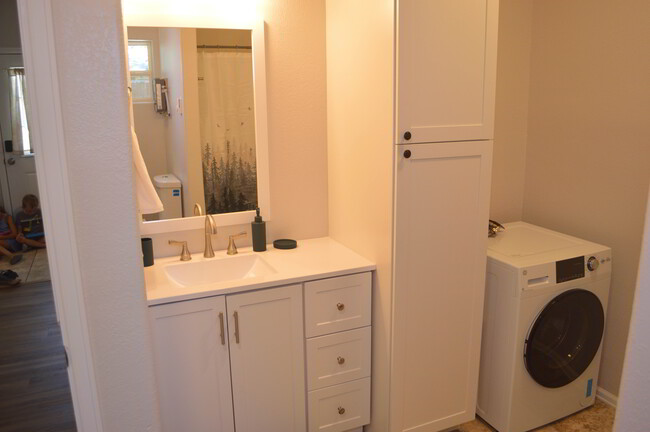 bathroom and laundry - 618 Hudson Bay Dr