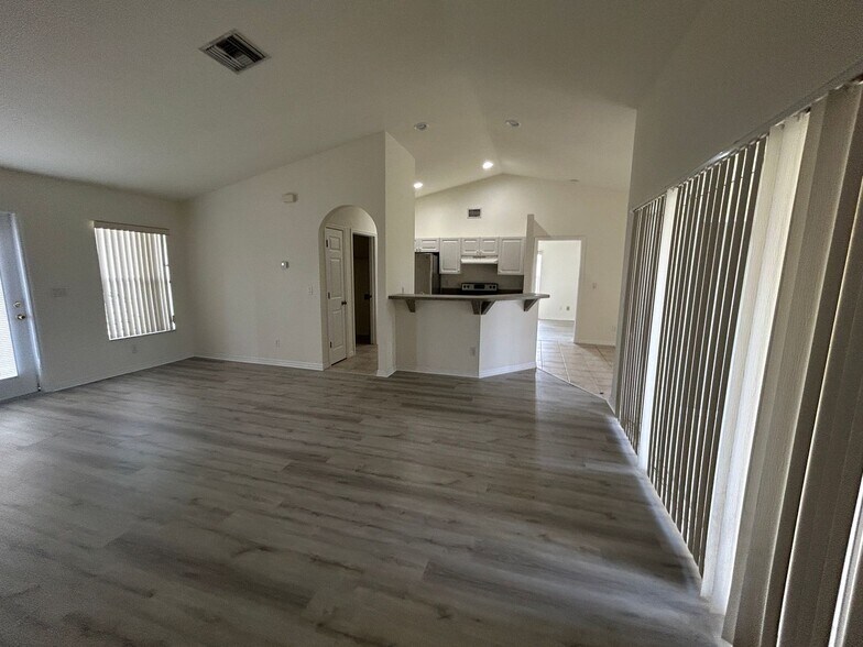 Building Photo - Nice 3/2 with newer carpet