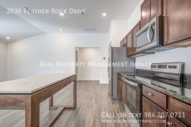 Building Photo - 2036 Feather Rock Dr