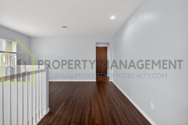 Building Photo - Spacious Elegance Awaits: 4-Bedroom Home with Hardwood Floors in Elk Grove!